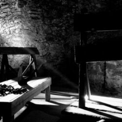 A dark dungeon photographed in black and white