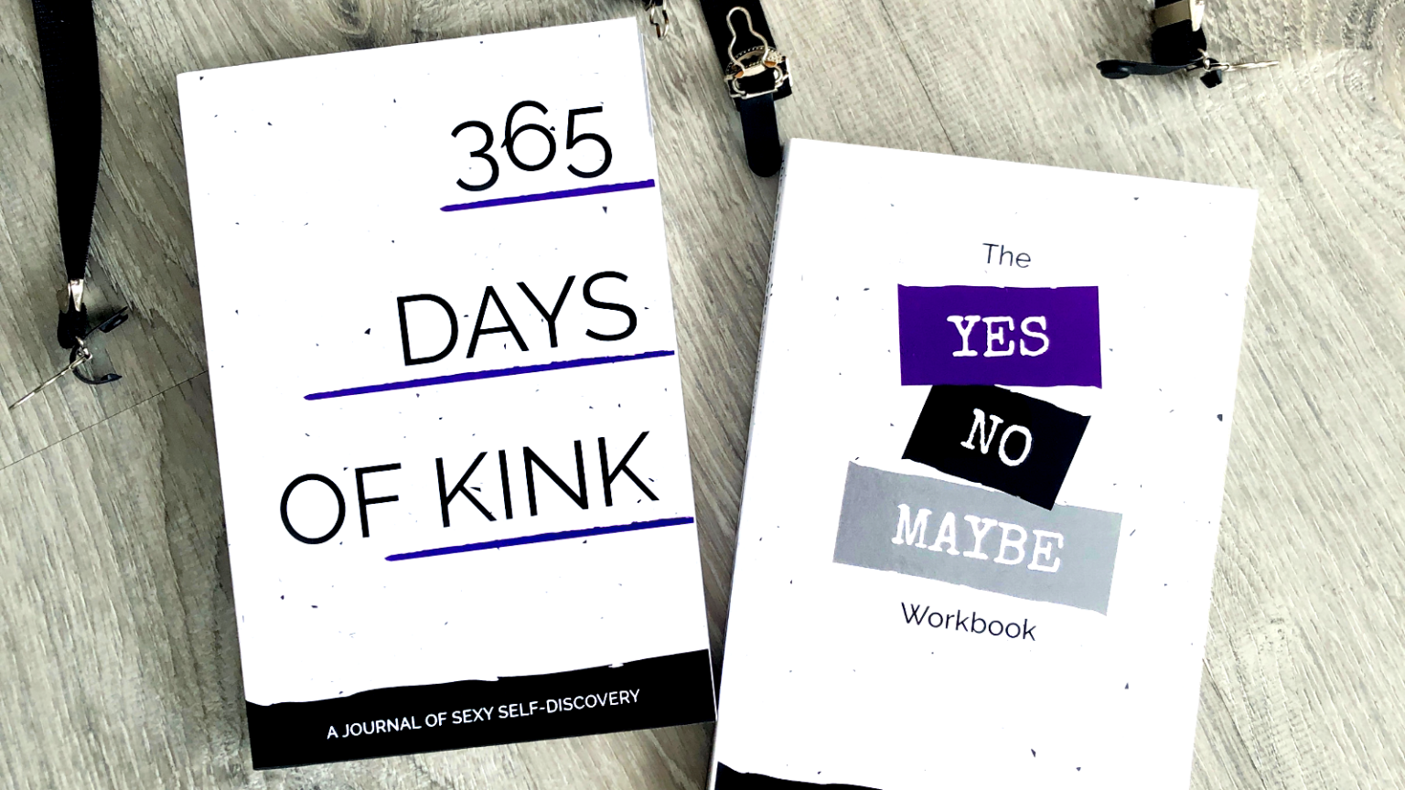 Photo of 365 Days of Kink Journal next to the Yes, No, Maybe Workbook